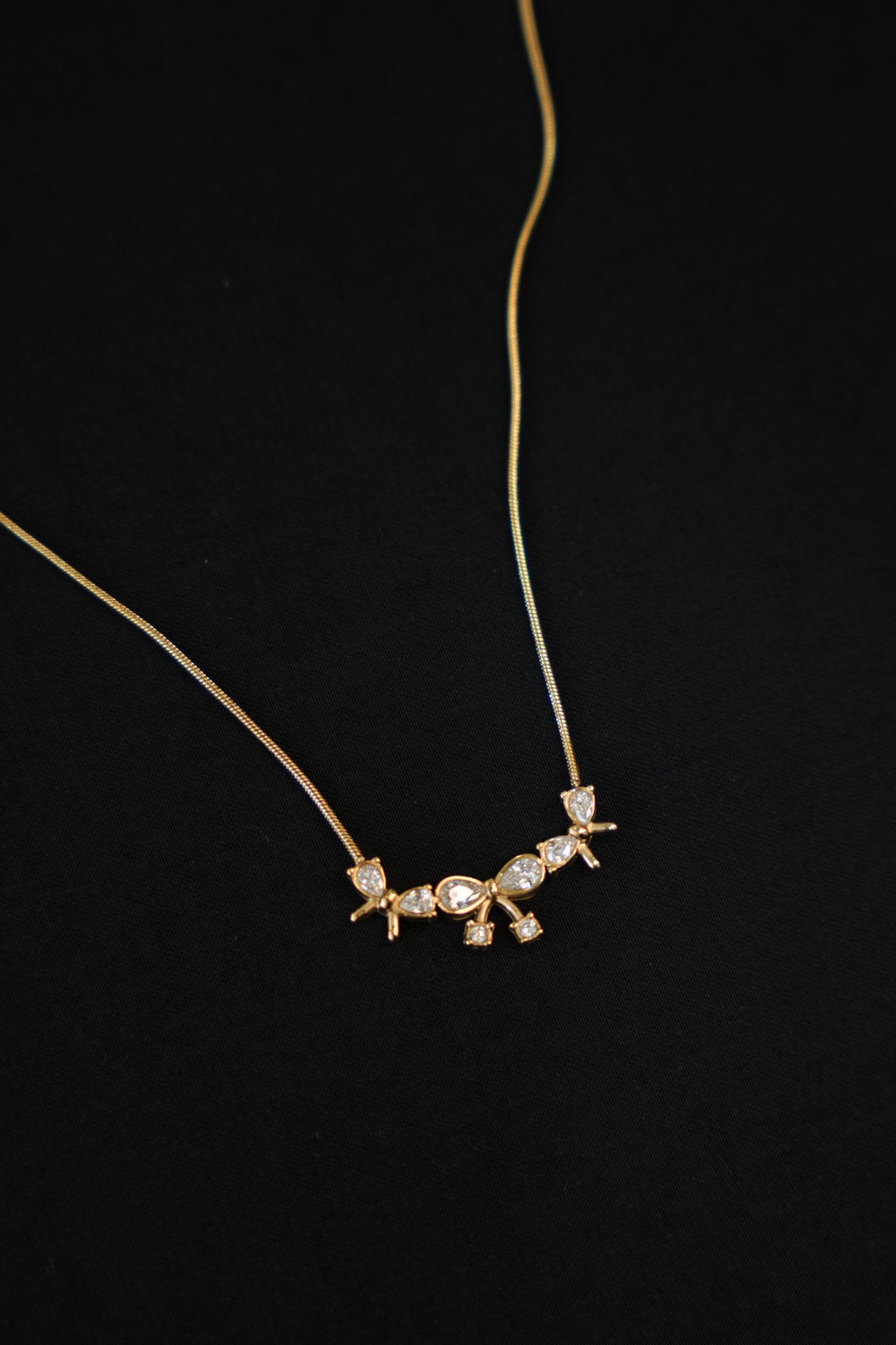 BANDHINI-GOLD TONE CLEAR STONE CHAIN